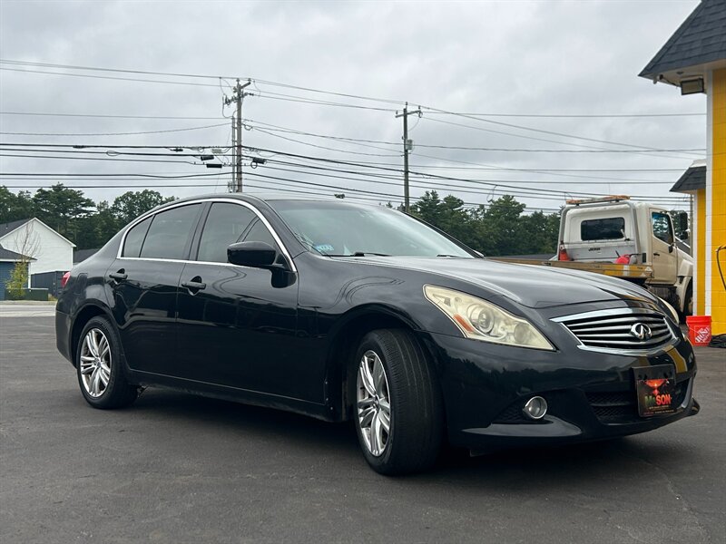 Side view of a used Infiniti on the M & Son lot on Roosevelt Trail in Windham, Maine